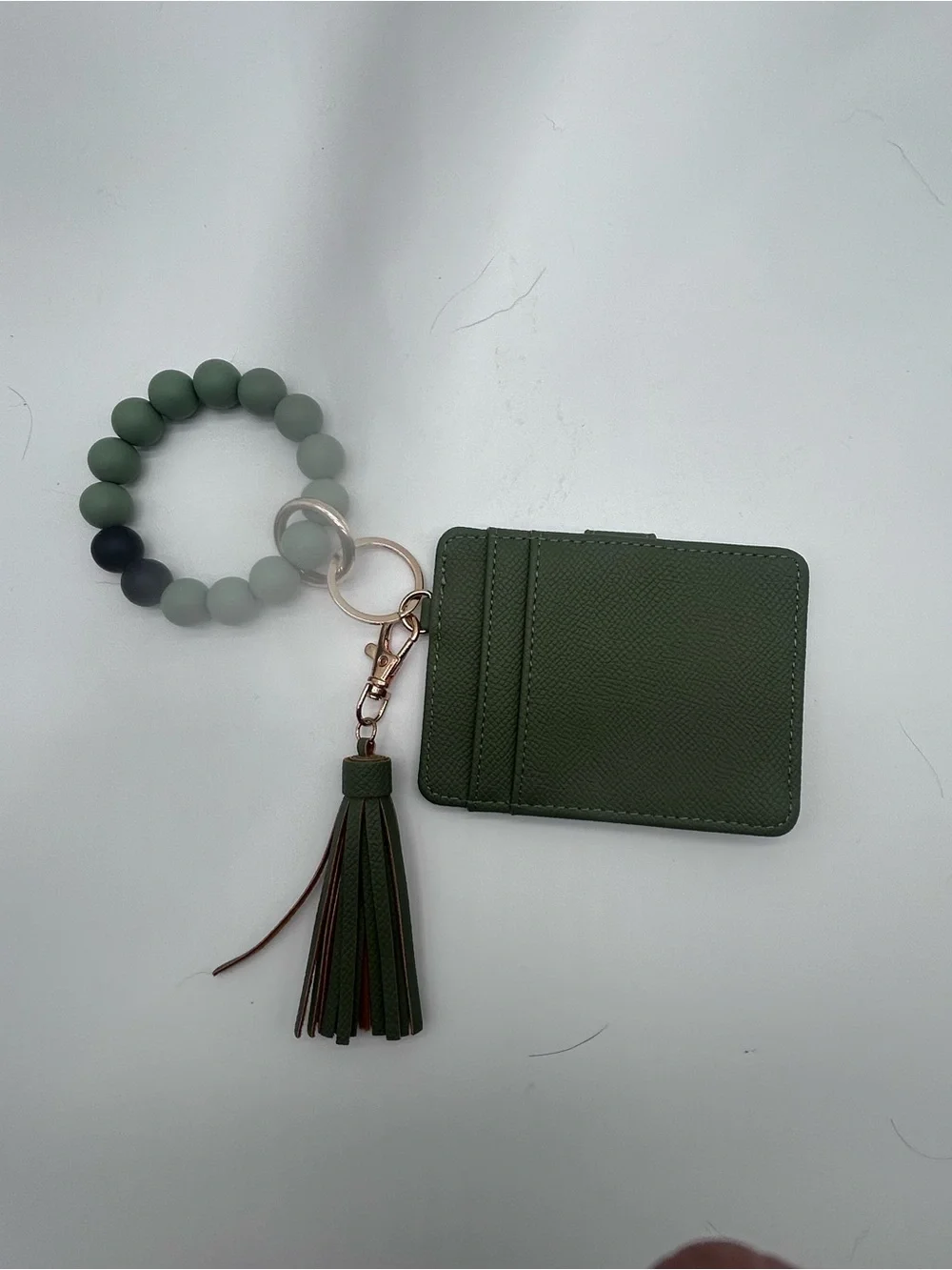 Try colored wallet with wristlet and tassel